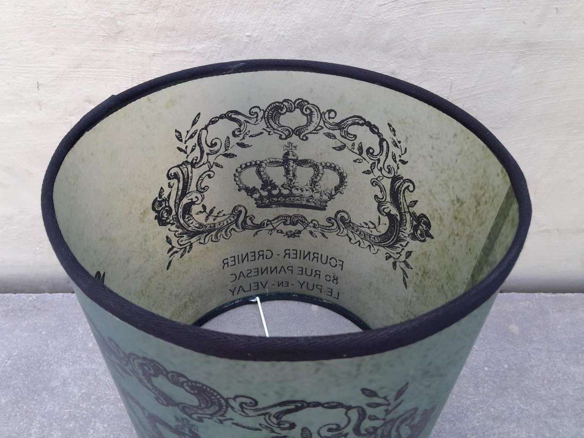 A Hand-Made Lampshade With Crest