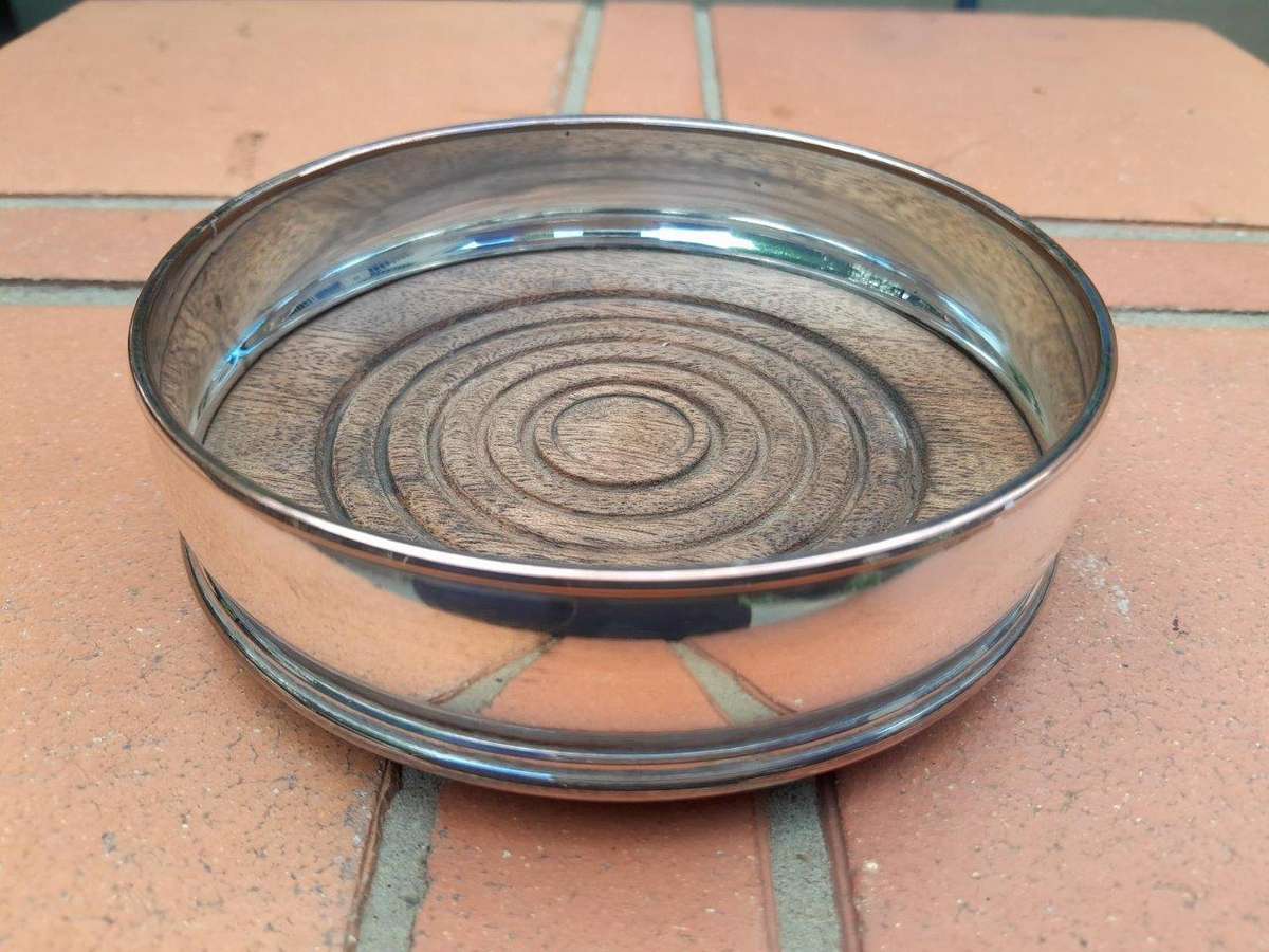 A 2oth Century Pair Of Electroplated Wine / Bottle Coasters