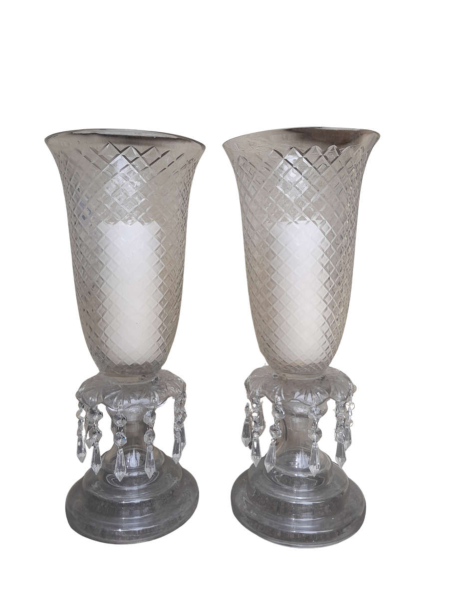 A Pair Of French Style Candle Holders With Candles
