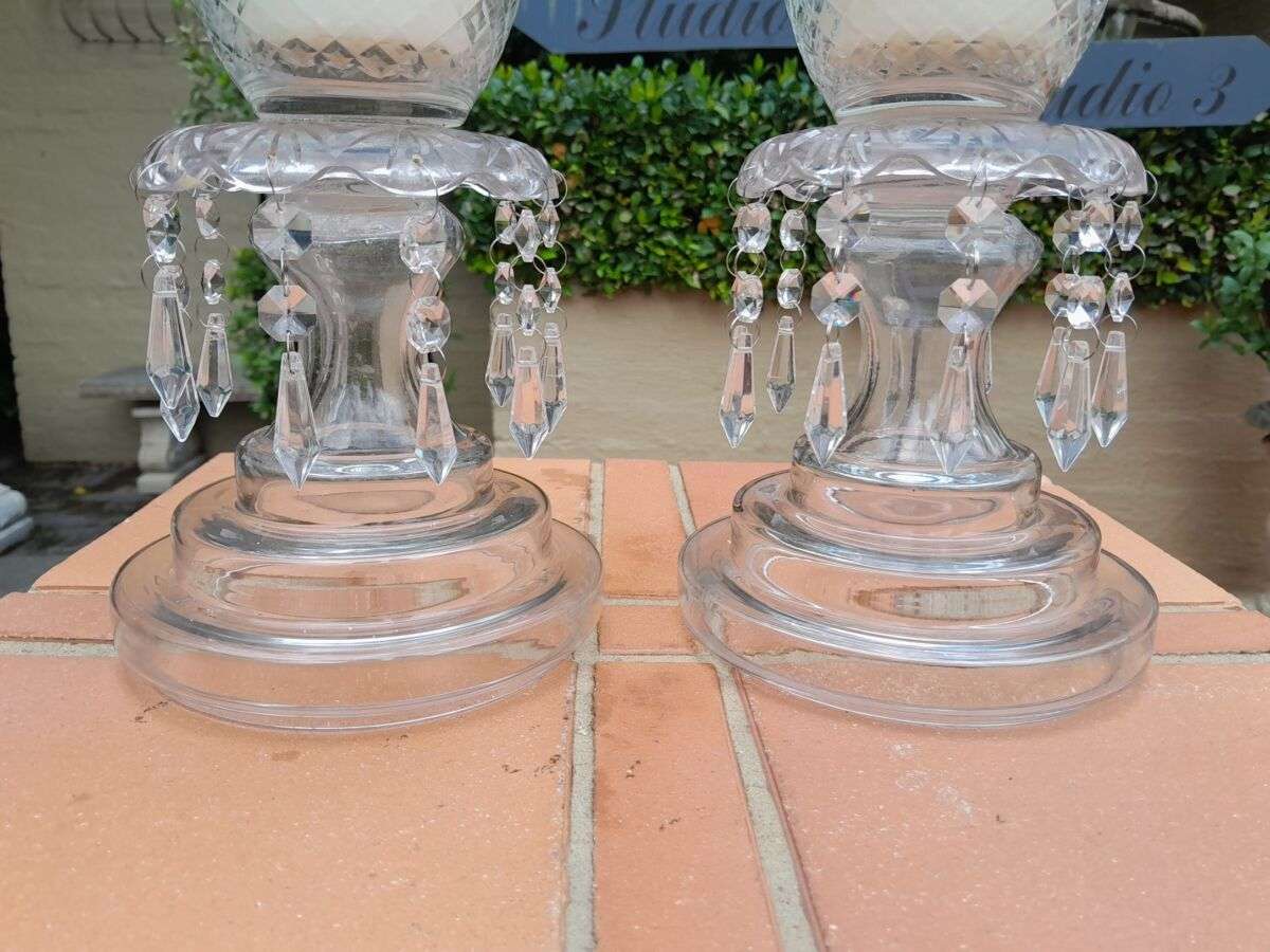 A Pair Of French Style Candle Holders With Candles