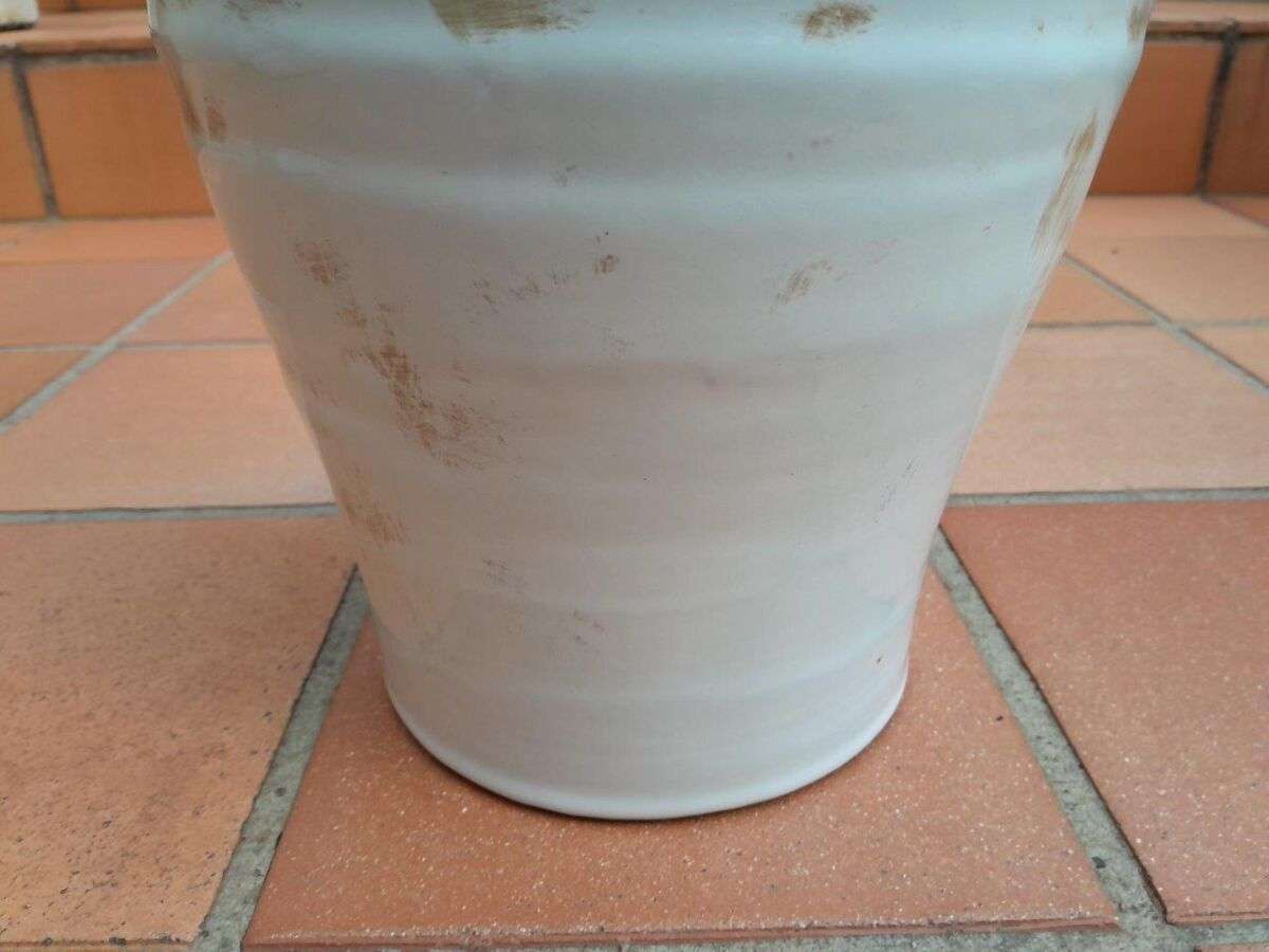 A Pair Of Large Ceramic Urns With Two Handles