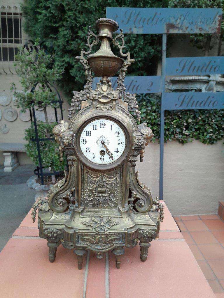 An Antique 19th Century Brass Clock