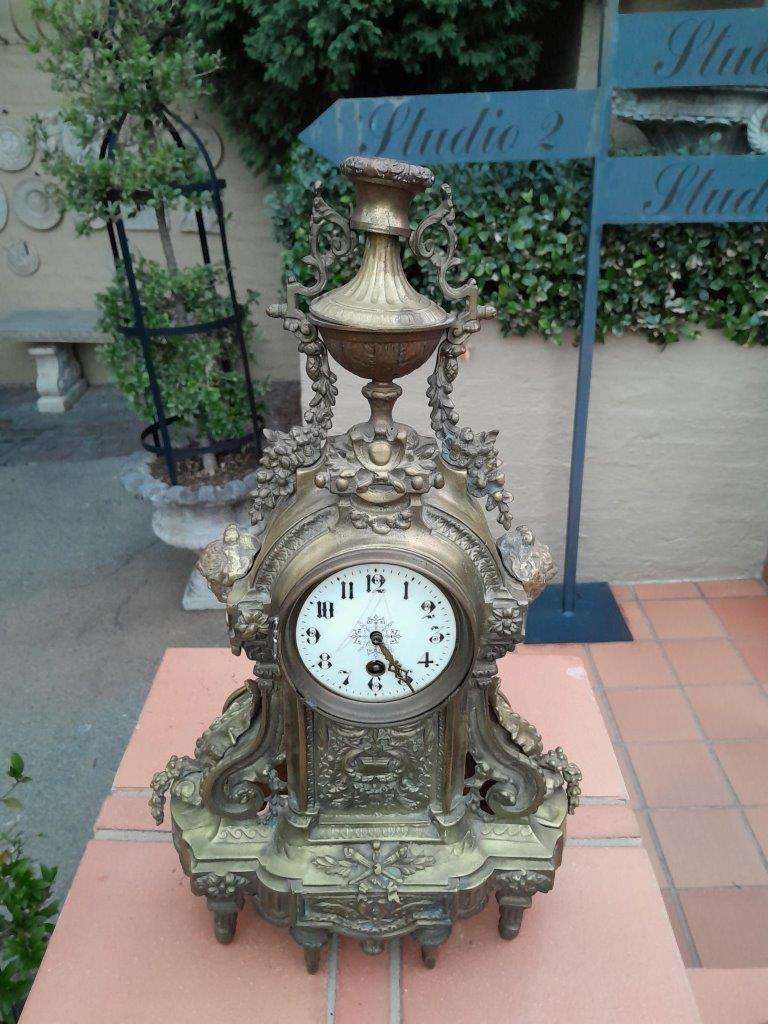 An Antique 19th Century Brass Clock