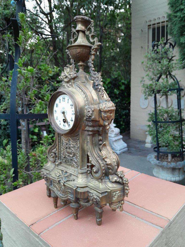 An Antique 19th Century Brass Clock
