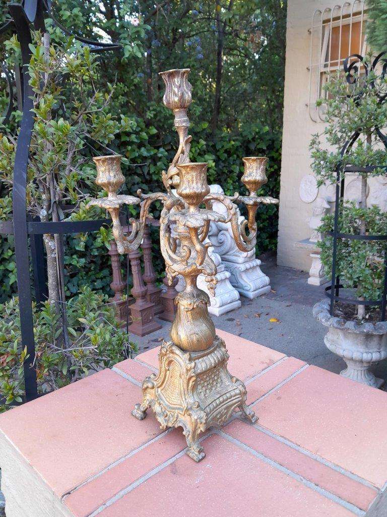 A 20TH Century French Rococo Style Brass Candelabra