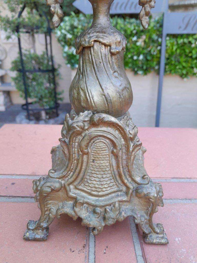 A 20TH Century French Rococo Style Brass Candelabra