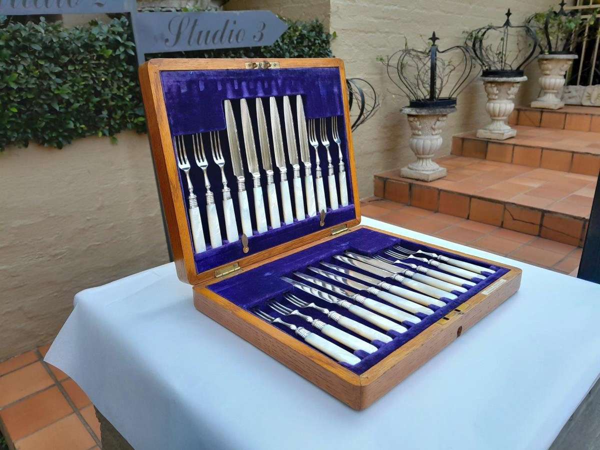 A 20th Century Sterling Silver With Pearl Handles Twelve Piece Fruit Knives And Forks By A Jack A...