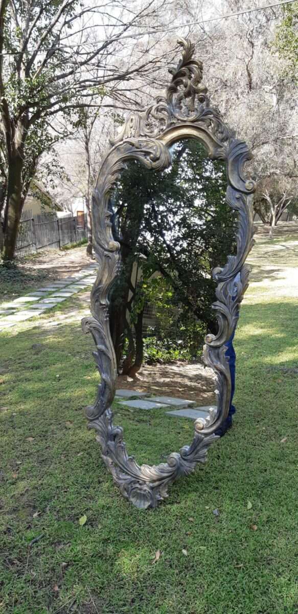 A Large Ornate Floral Carved Mirror