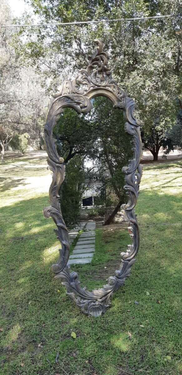A Large Ornate Floral Carved Mirror