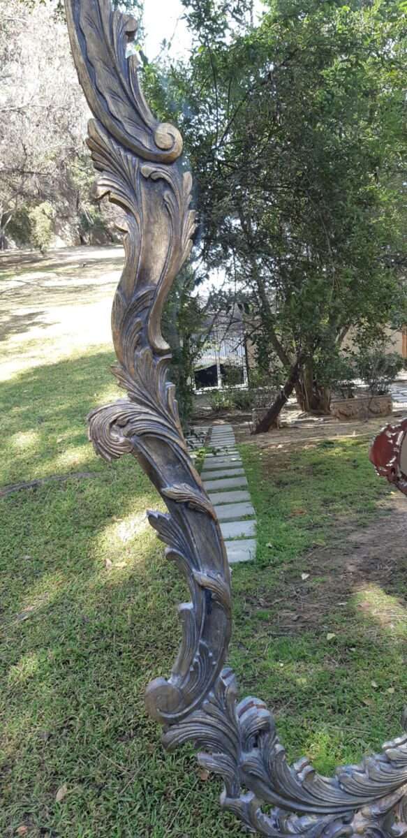 A Large Ornate Floral Carved Mirror
