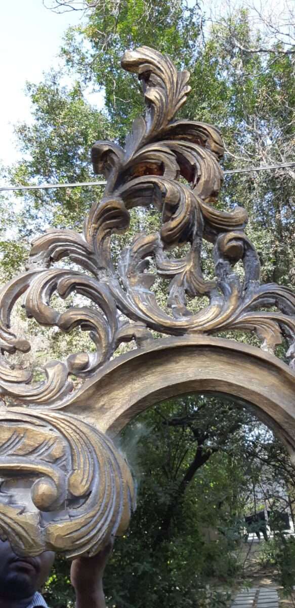 A Large Ornate Floral Carved Mirror