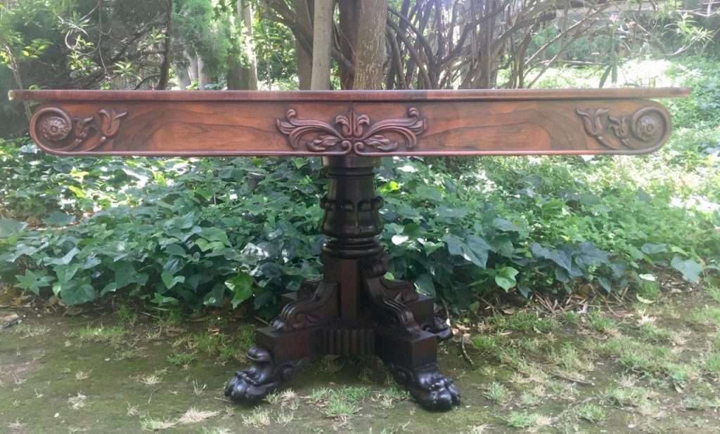Victorian rosewood library table with two drawers on castors