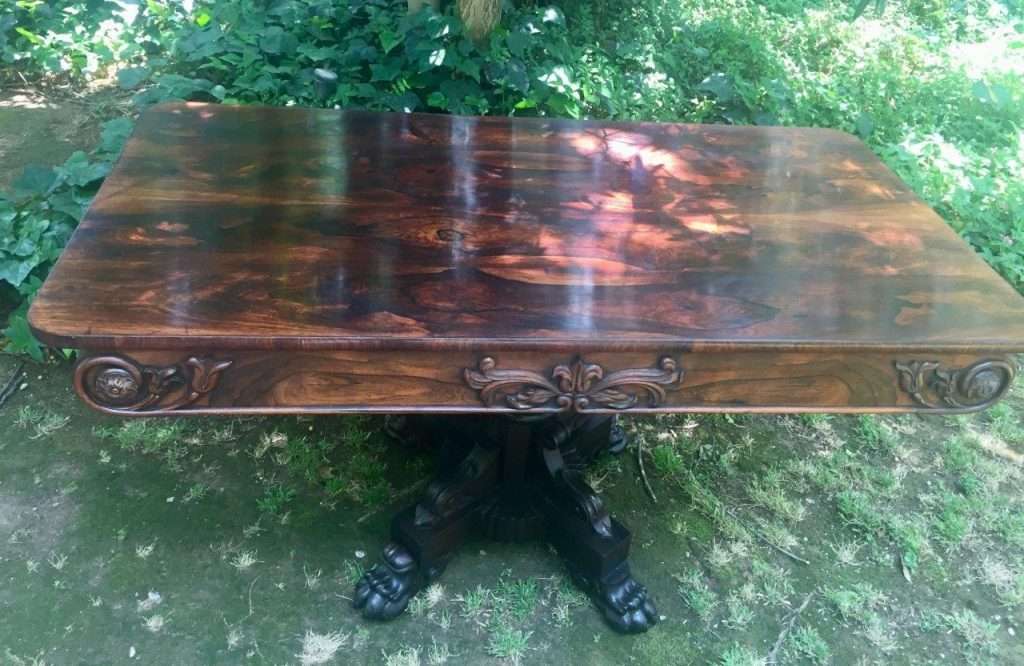 Victorian rosewood library table with two drawers on castors