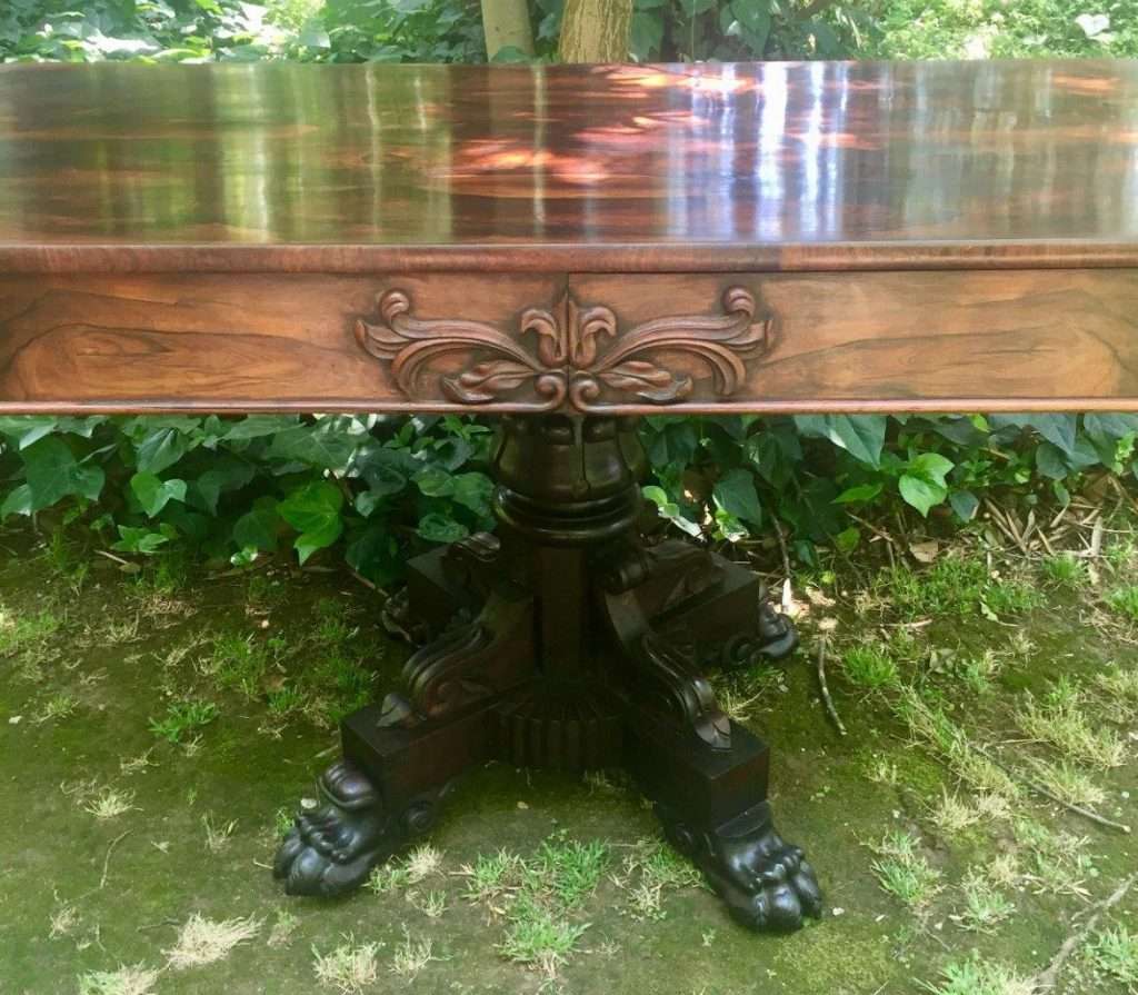 Victorian rosewood library table with two drawers on castors