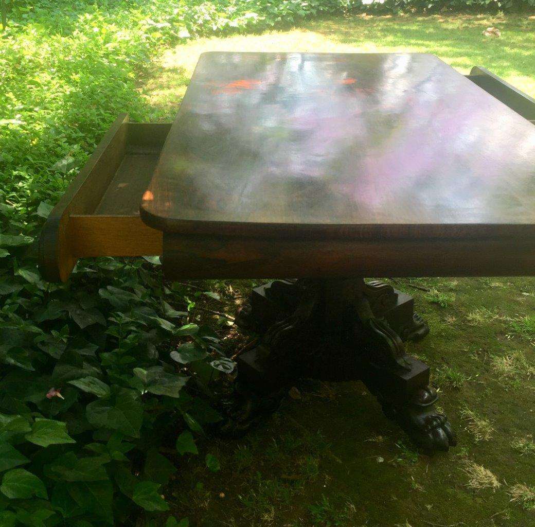 Victorian rosewood library table with two drawers on castors