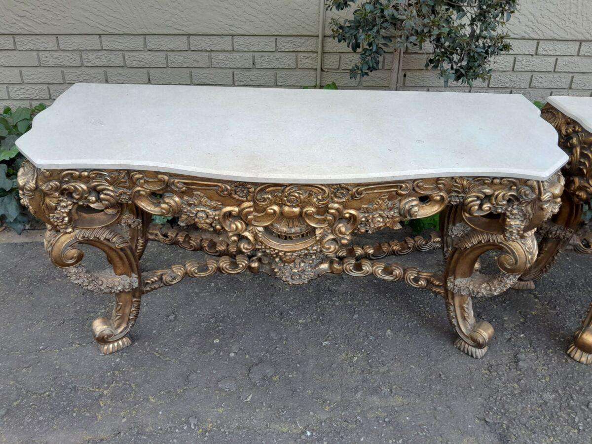 Pair Louis XVI style moulded and gilded Console / Hall Tables, with moulded serpentine fronted gr...