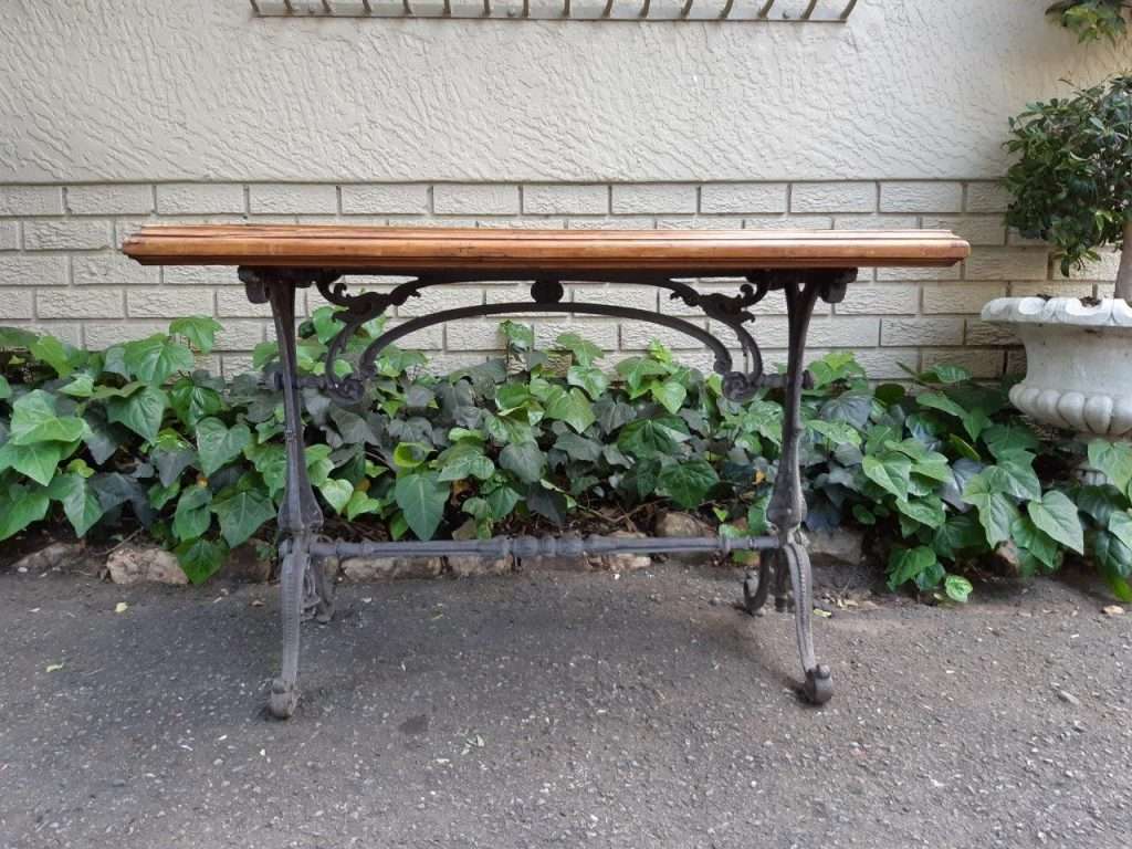 A Victorian Cast-Iron And Pine Table