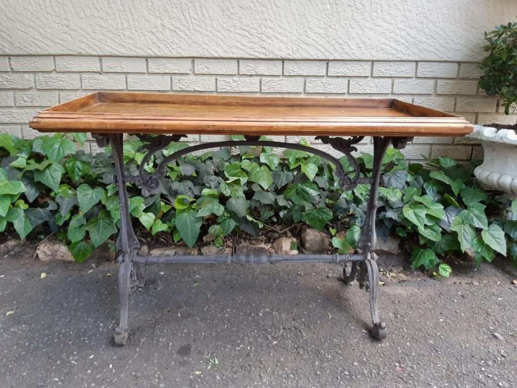 A Victorian Cast-Iron And Pine Table