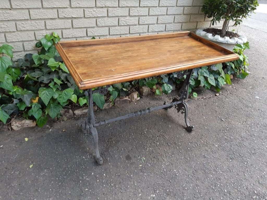 A Victorian Cast-Iron And Pine Table