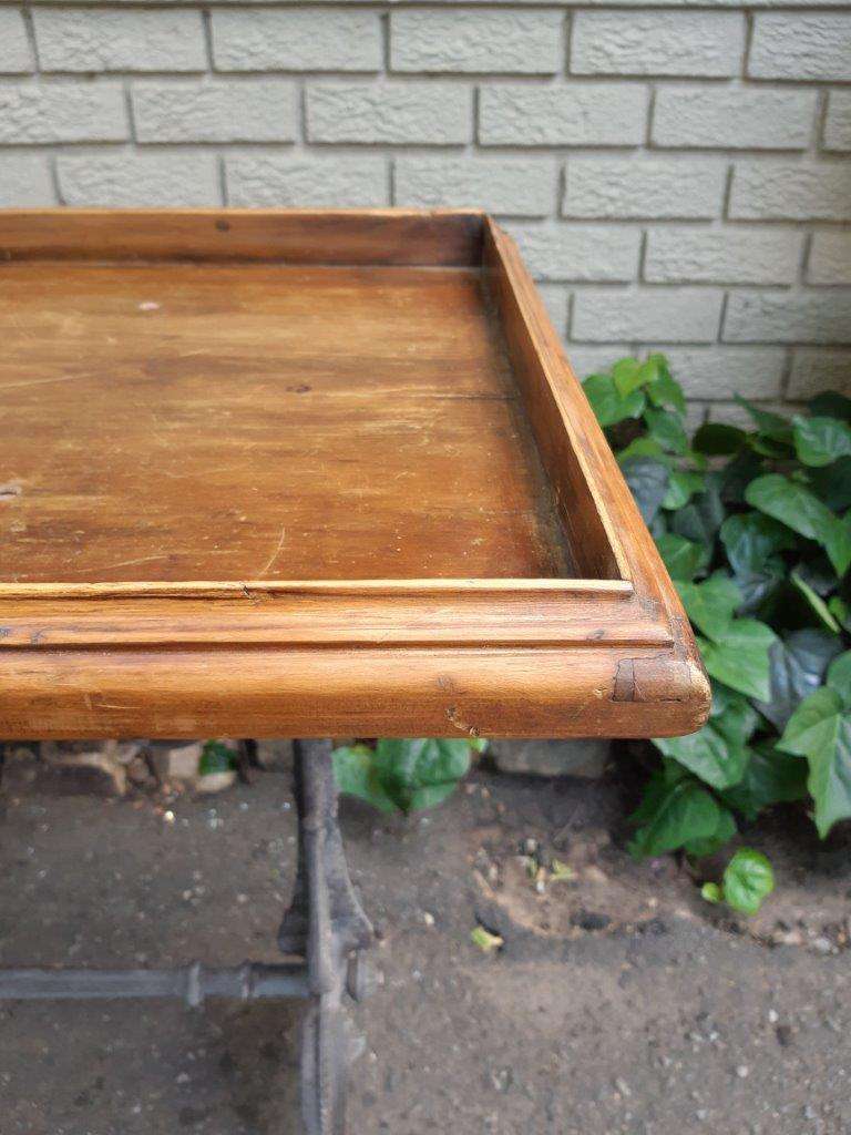 A Victorian Cast-Iron And Pine Table