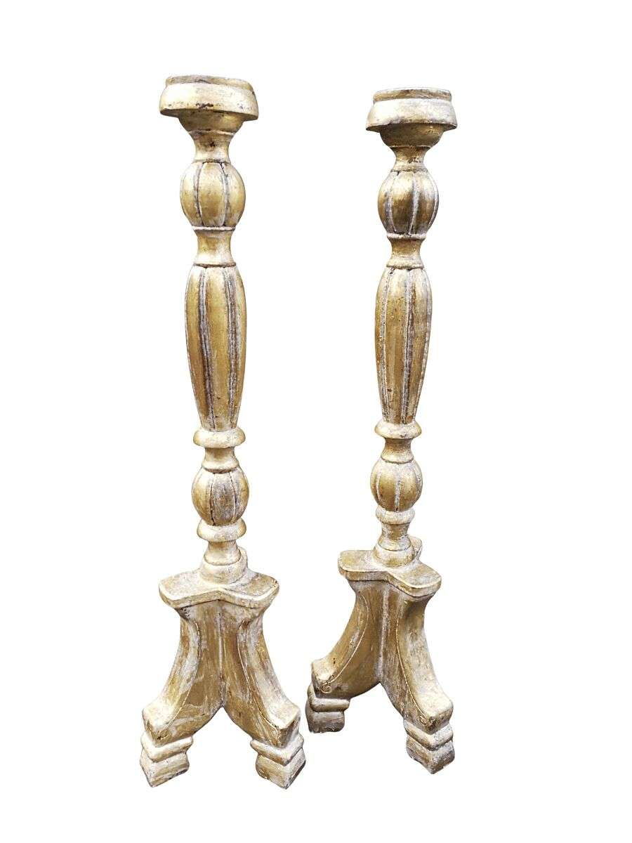 A Pair Of Carved Wooden Candle Holders Hand Gilded With Gold Leaf