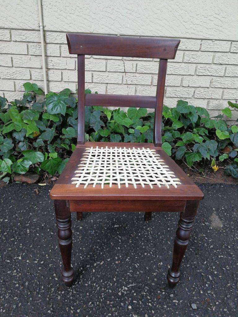 A Pair Of Cape Regency Stinkwood Chairs