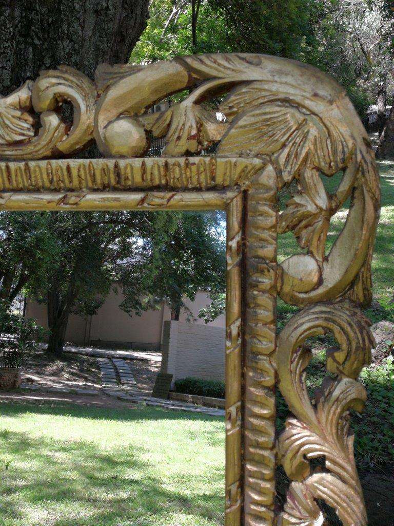 Ornately Carved Gilded Mirror