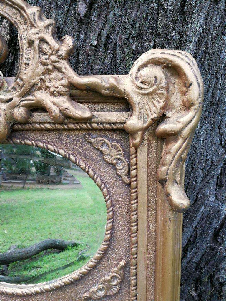 Ornately Carved Oval Gilded Mirror