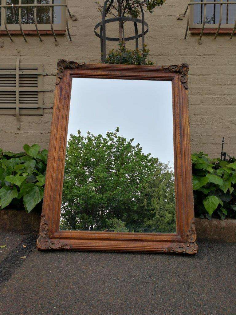 A vintage wooden gilded mirror