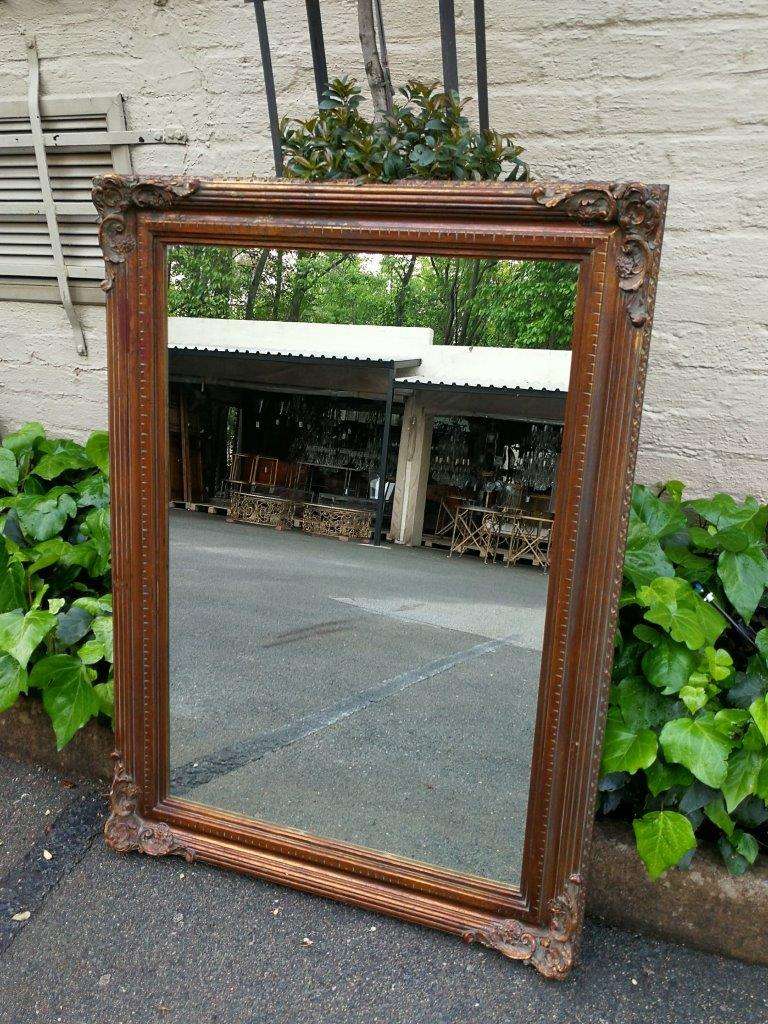 A vintage wooden gilded mirror