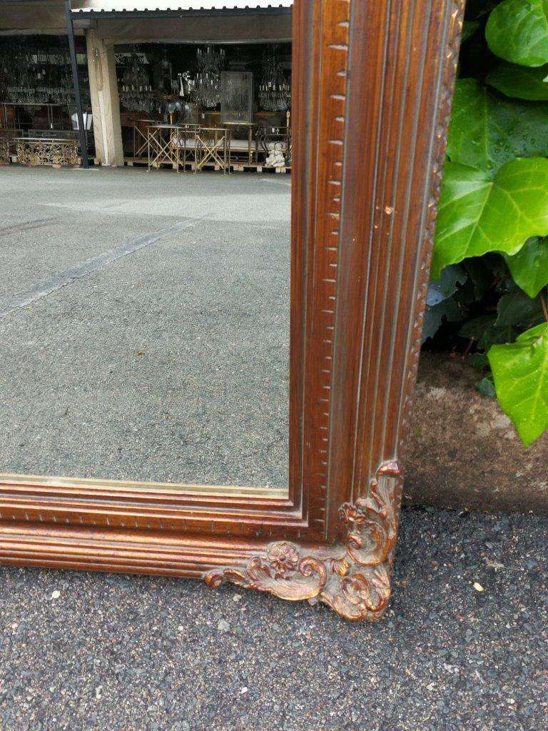 A vintage wooden gilded mirror