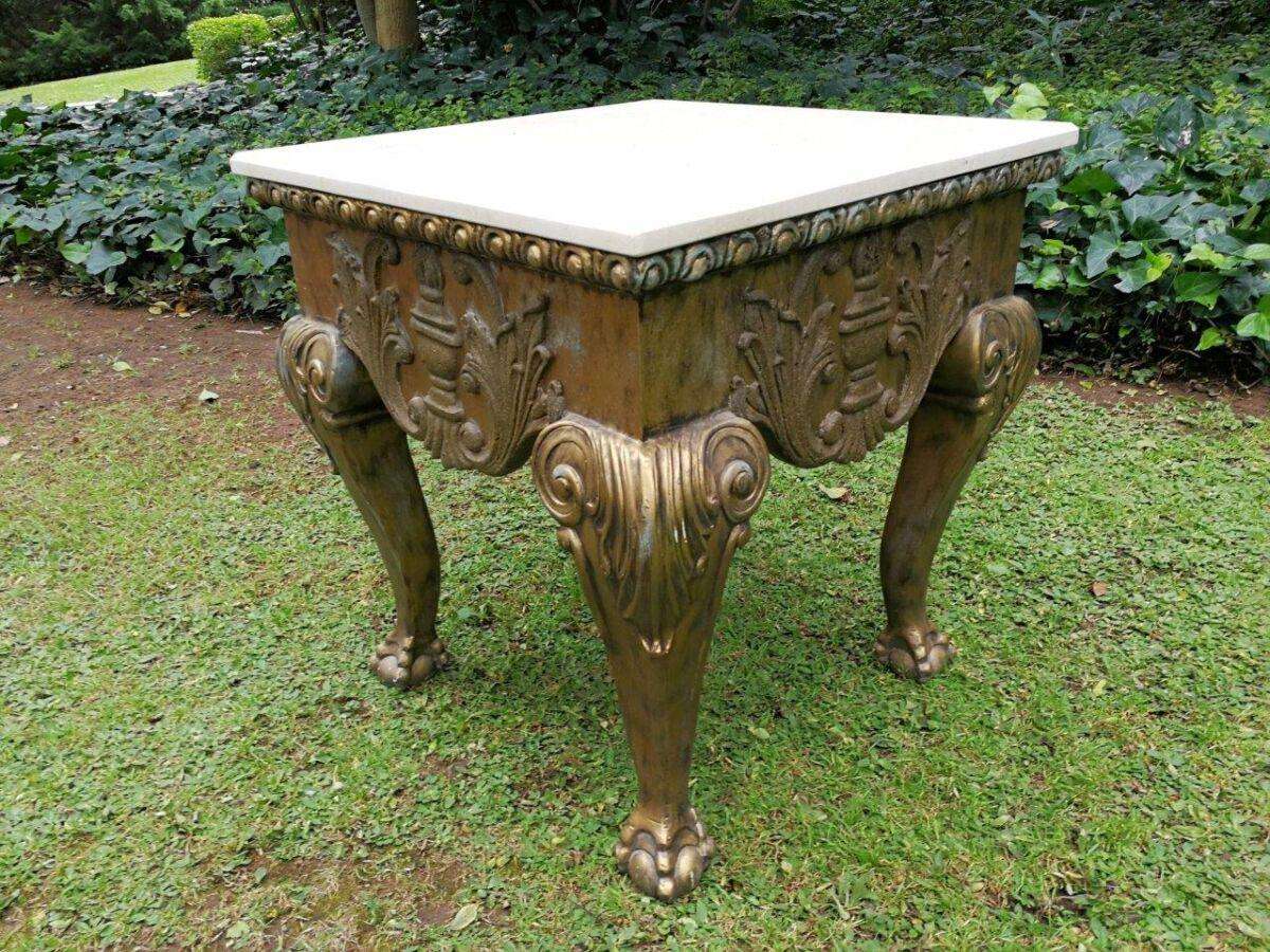 A Gilt Wood Coffee Table With Cream Marble Top