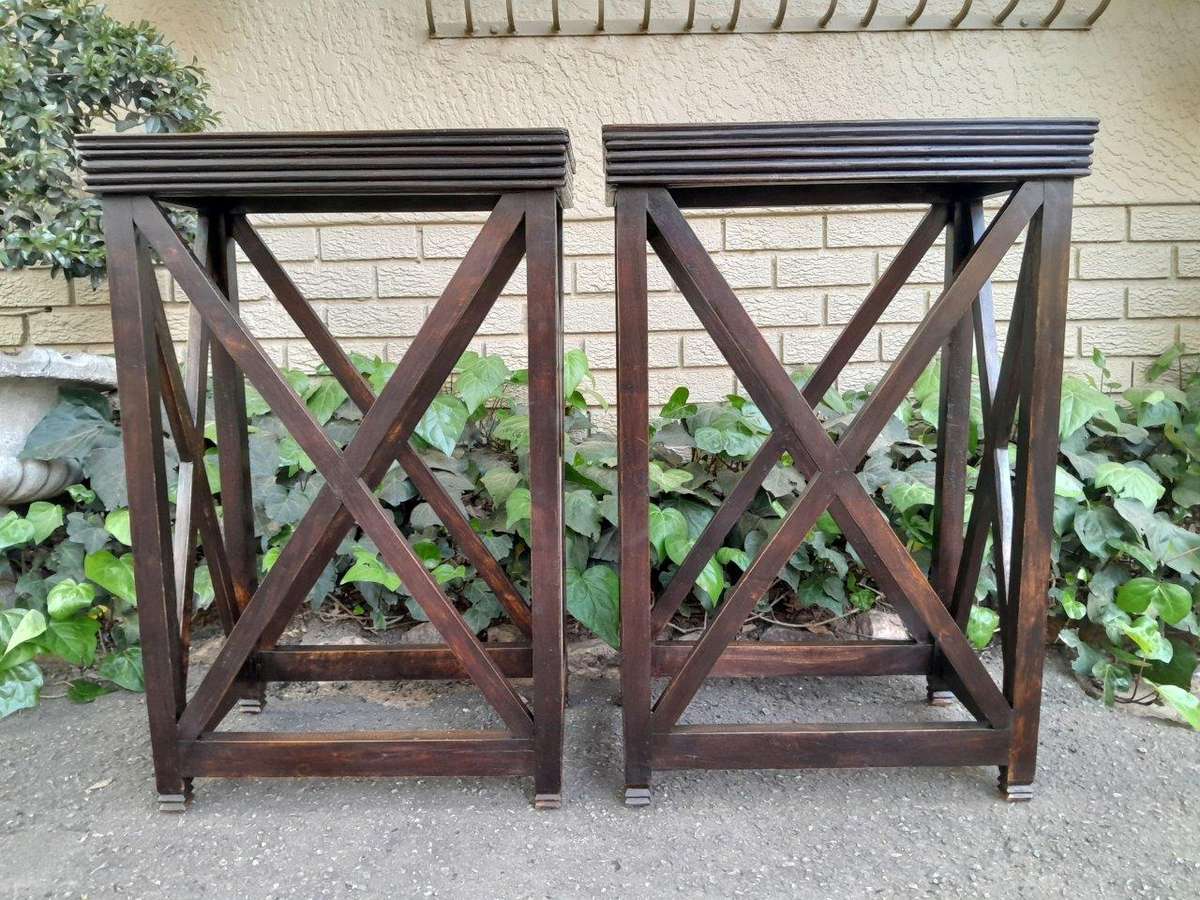 A 20th Century Pair of Teak Stands