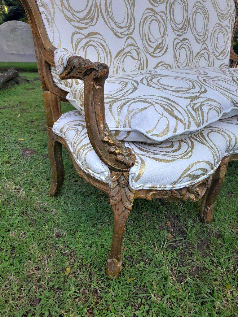 A 20TH Century French Hand Carved and Hand Gilded Settee