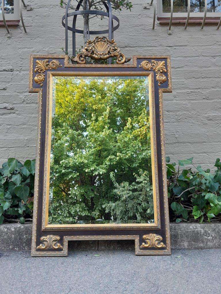 A 20TH Century Carved and Gilded Bevelled Mirror