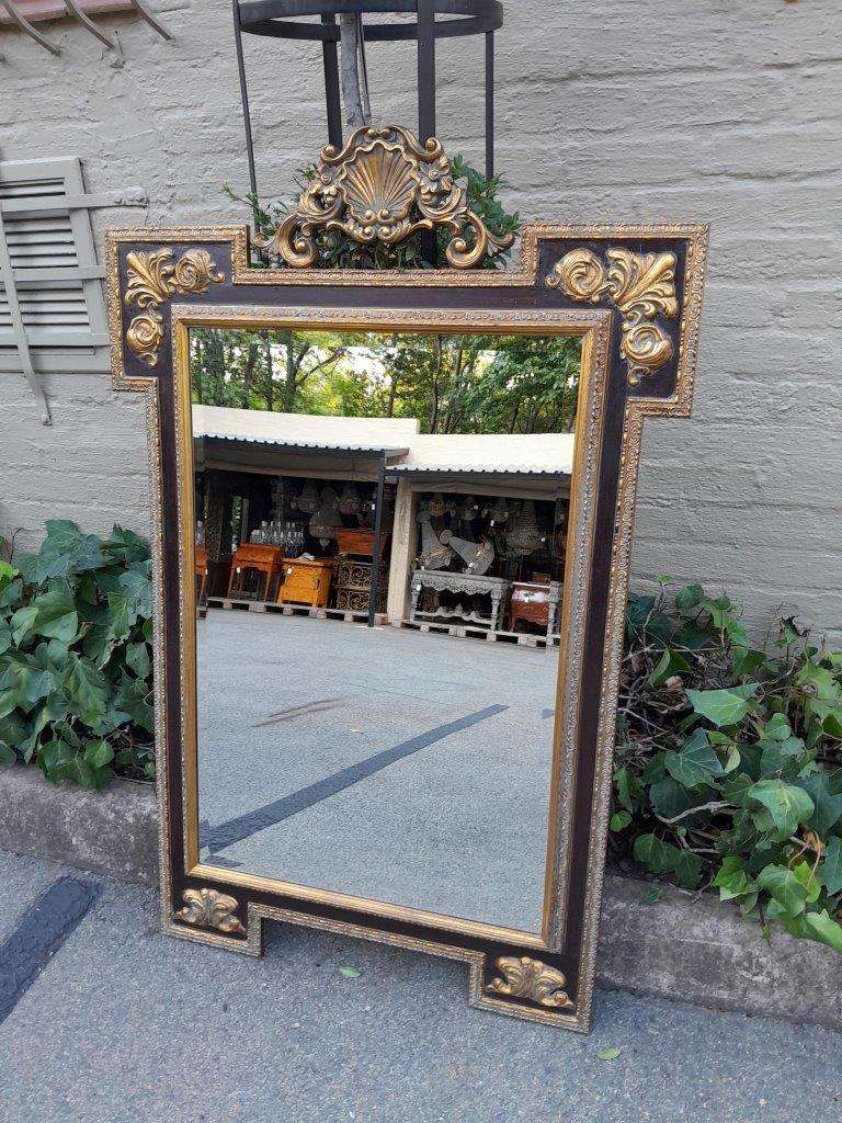 A 20TH Century Carved and Gilded Bevelled Mirror