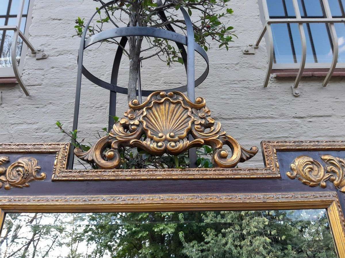 A 20TH Century Carved and Gilded Bevelled Mirror