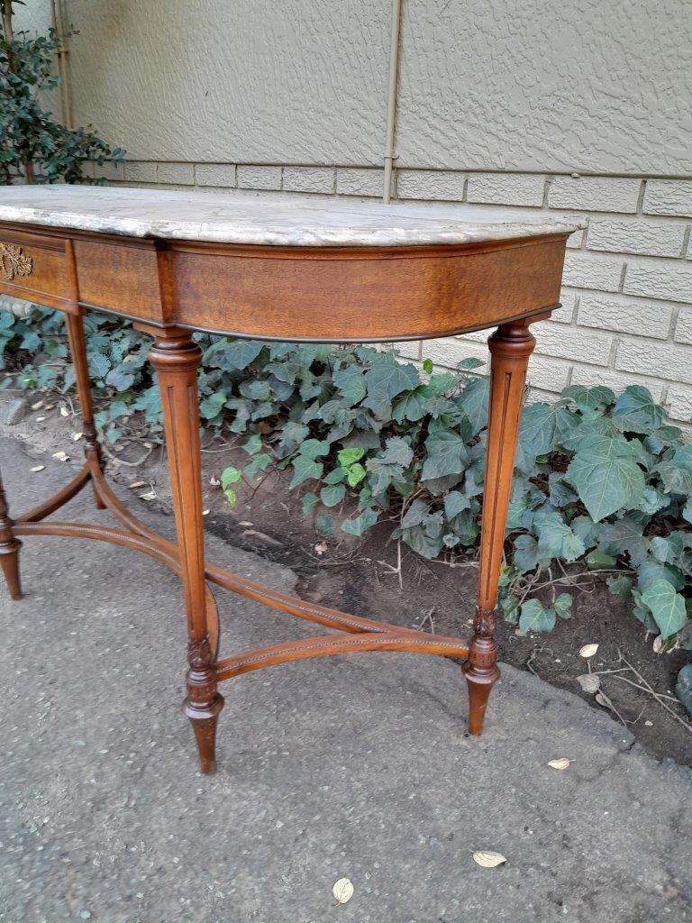 A 20th Century French Walnut  Console Table With Marble Top