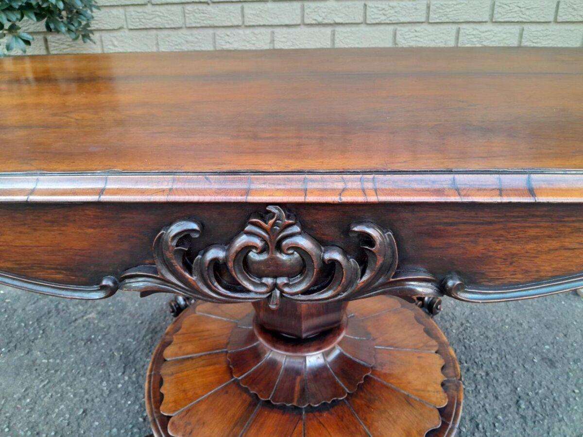 An Antique Victorian Rosewood Sofa Table on Castors
