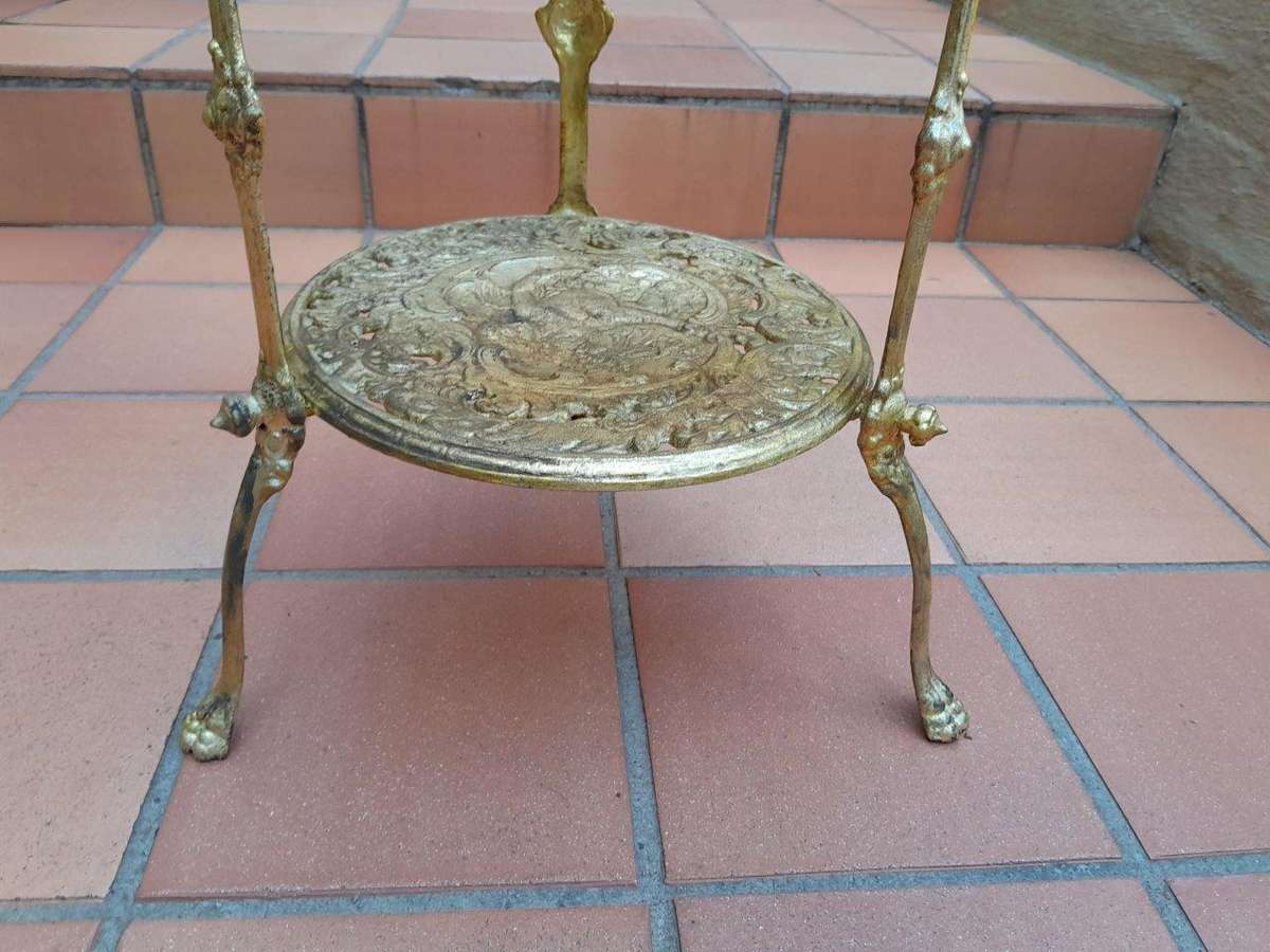 A Circa 1900s Cast Metal Display Stand