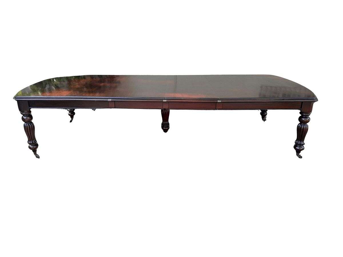 An Antique and Massive Victorian Mahogany Extending Table with Two Extensions and Original Castor...