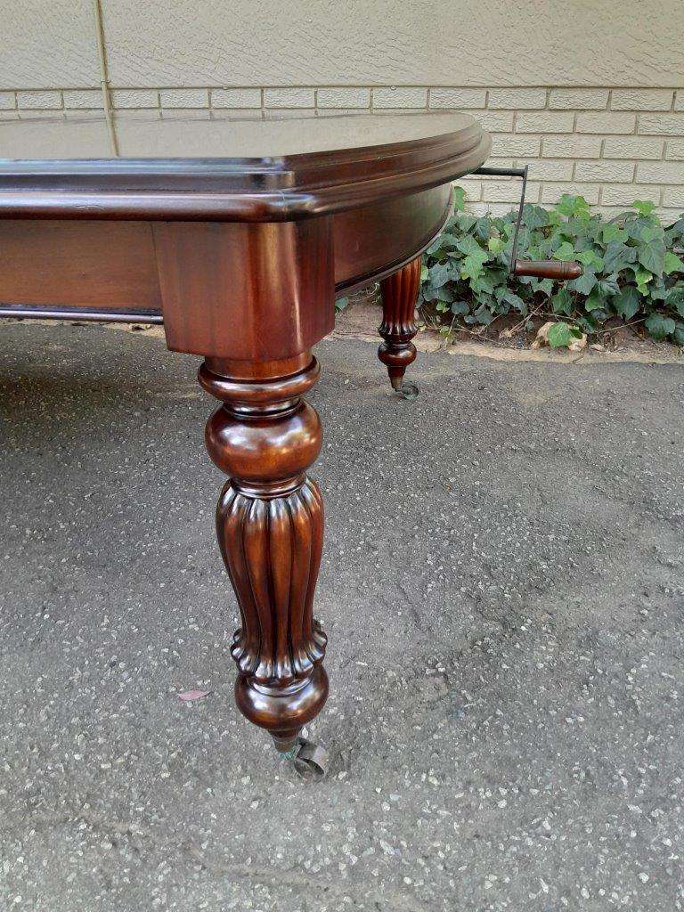 An Antique and Massive Victorian Mahogany Extending Table with Two Extensions and Original Castor...