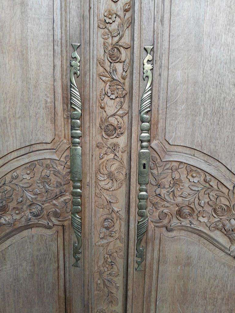 A 19th Century French Carved Oak Armoire With Drawers And Shelves