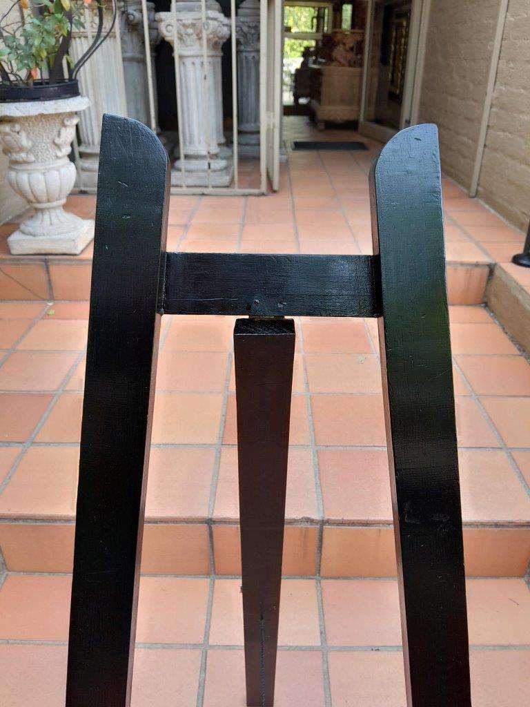 A Decorative Wooden Display Easel In An Ebonized Contemporary Finish