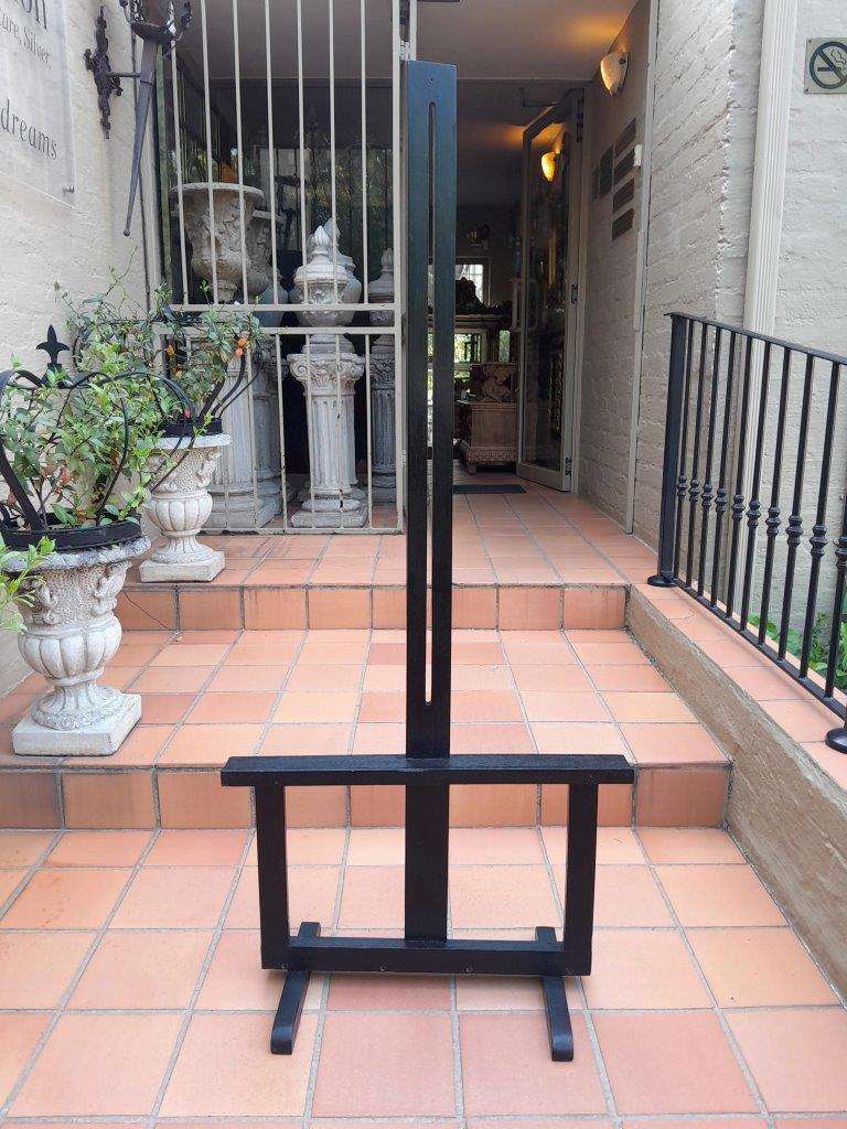 A Decorative Wooden Display Easel In An Ebonized Contemporary Finish