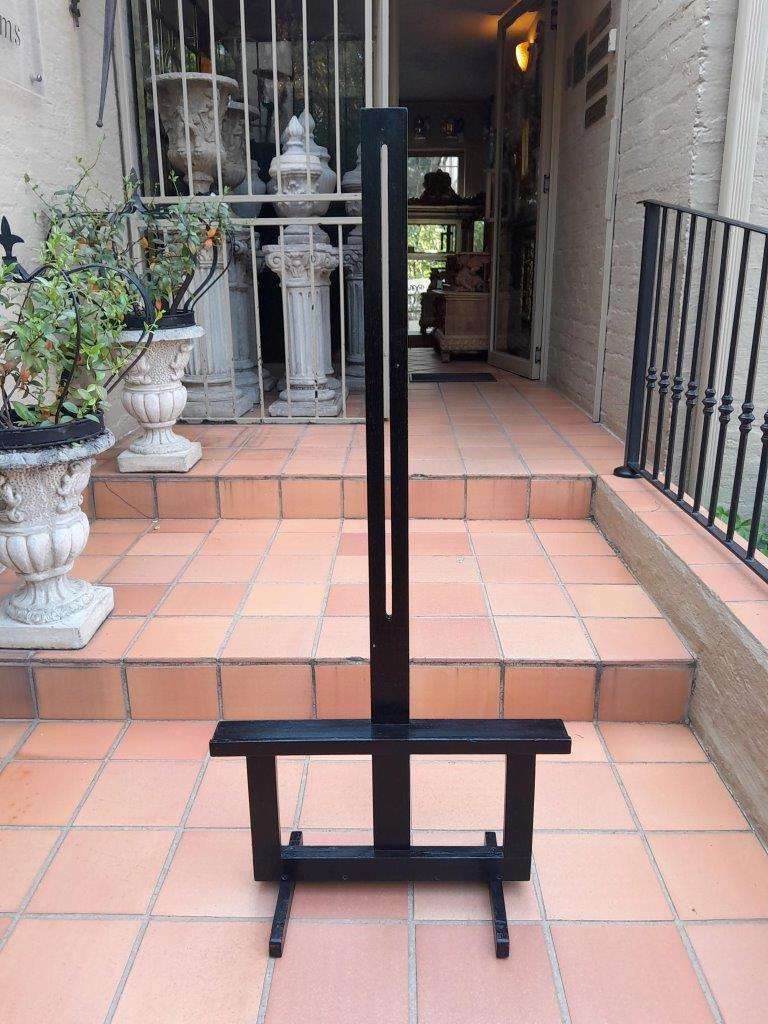 A Decorative Wooden Easel In An Ebonized Contemporary Finish