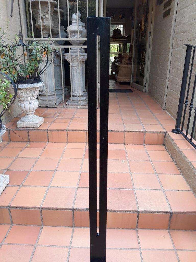 A Decorative Wooden Easel In An Ebonized Contemporary Finish