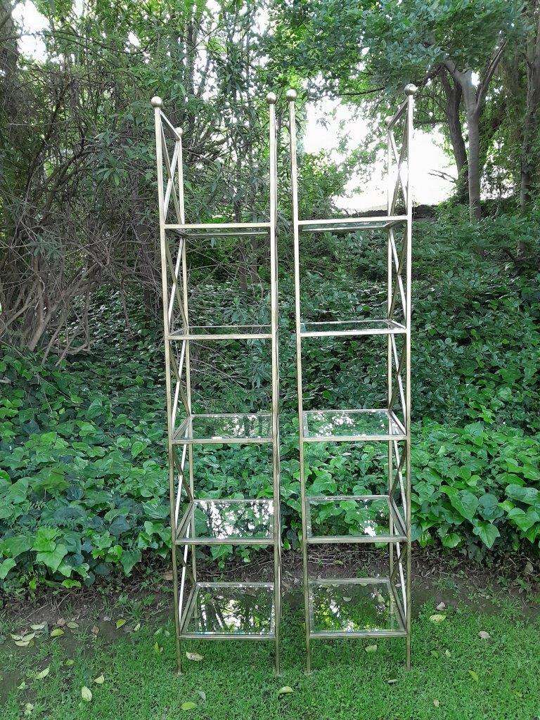 A Pair Of Wrought Iron And Gilded Display Stands With Bevelled Glass Shelves Custom-Made For The ...