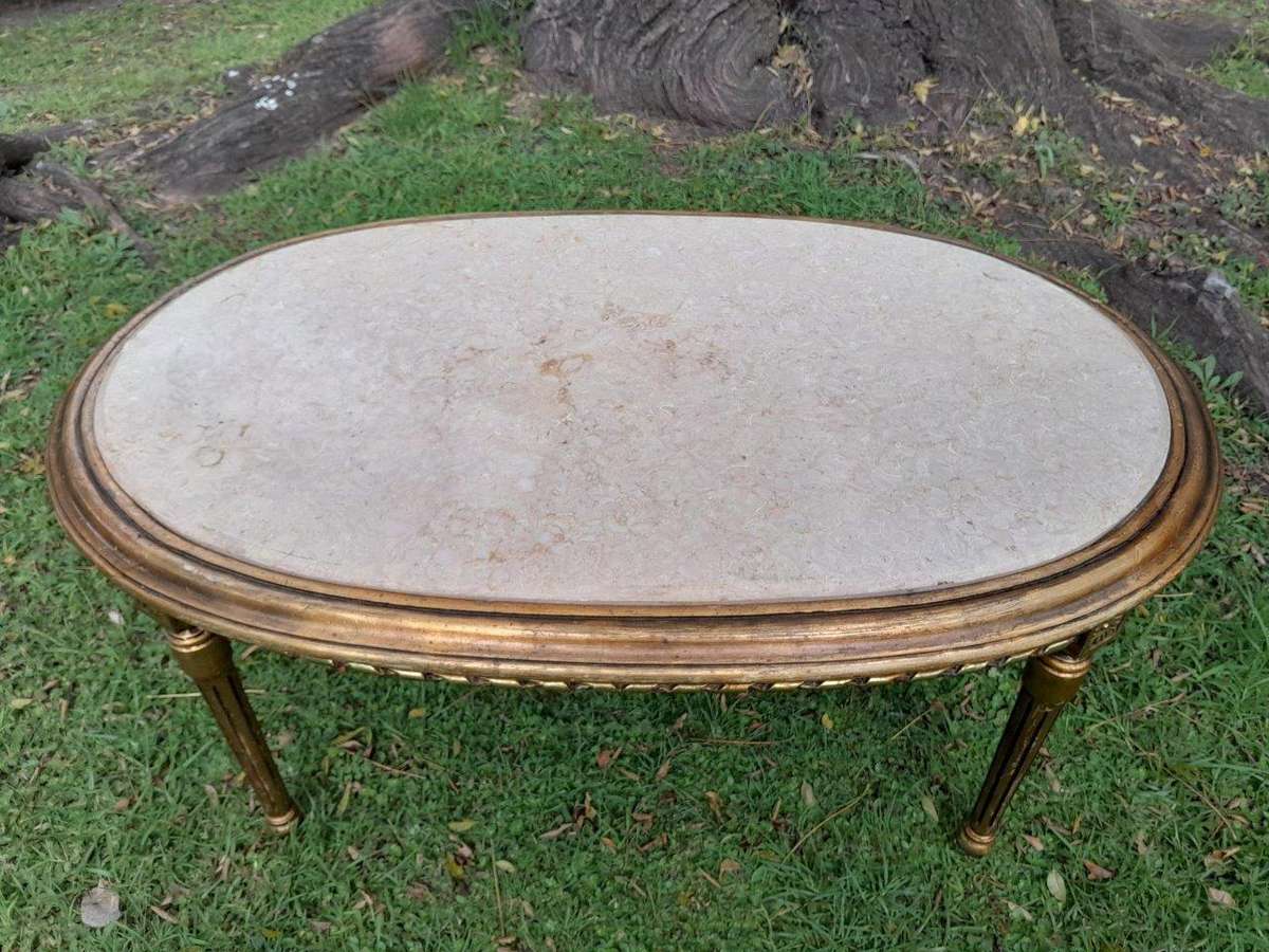 A French Style Oval Carved Giltwood Coffee Table With A Marble Top