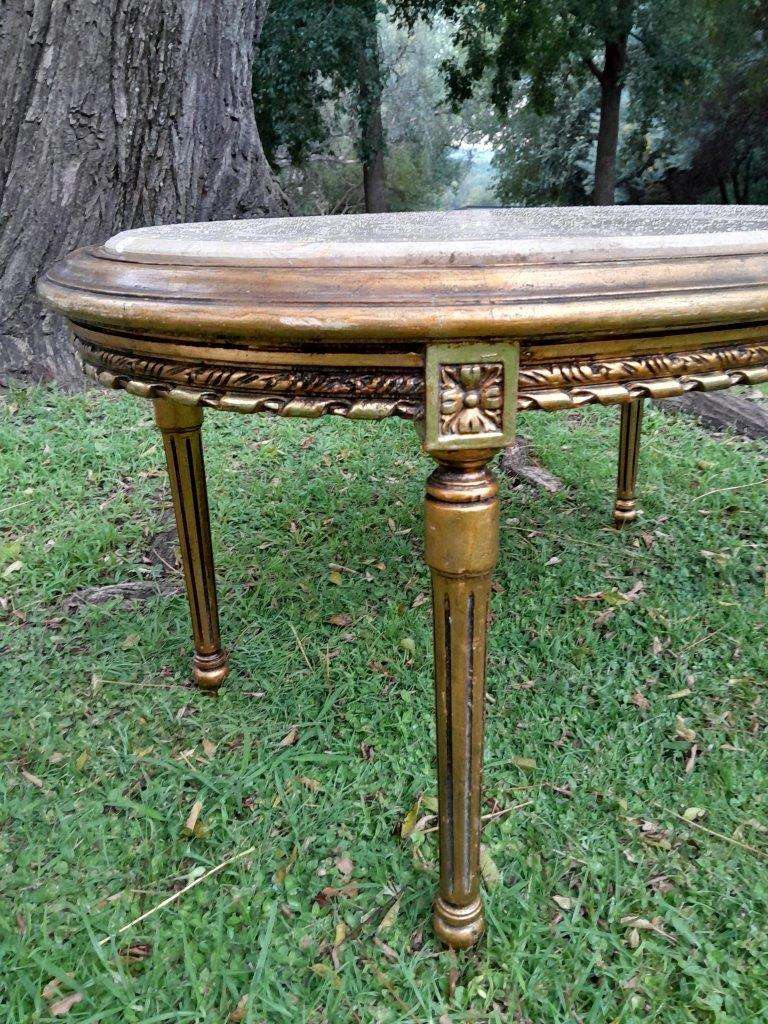 A French Style Oval Carved Giltwood Coffee Table With A Marble Top